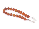 Handmade adjustable caramel amber teething bracelet with double knotted natural beads