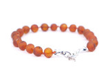 Adjustable baltic amber teething jewellery with raw unpolished caramel beads for kids