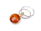 Gold plated two-tone circle orbital amber pendant