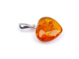 Baltic amber heart pendant / sterling silver bail