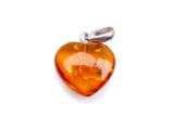 Baltic amber heart pendant / sterling silver bail