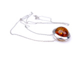 Baltic amber round moon shape silver pendant