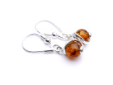 Baltic amber spheres dangle earrings in sterling silver