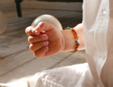 Amber teething bracelet for kids and babies with natural jade gemstones