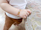 honey Baltic amber bracelet for kids with blue aquamarine gemstones handmade in Europe - traditional teething style design