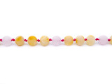 Lightweight raw amber and rose quartz bracelet for children made with individually knotted beads for safety - traditional teething style design
