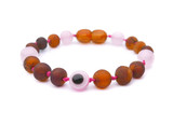 Raw amber bracelet for teething featuring pink quartz and Evil Eye motif natural Baltic amber nuggets