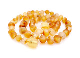 Natural unpolished honey amber bead necklace crafted from raw Baltic amber for children