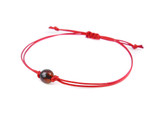 Red string bracelet with dark cherry amber