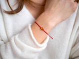 Red string bracelet with Baltic amber