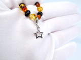 Small Star Jewellery Charm for Amber Bracelets – Lightweight decorative star pendant with a convenient lobster clasp, ideal for customising Baltic amber teething bracelets, necklaces and anklets