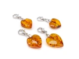Heart-Shaped Baltic Amber Pendant for Teething Necklaces and Anklets – Handcrafted natural amber heart charm with a warm honey-golden appearance, combining the beauty of authentic Baltic amber with a timeless symbol of love