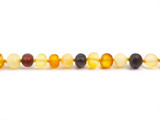 Eco-friendly handmade Baltic amber bracelet for kids with multicoloured raw amber beads and secure clasp - traditional teething style design