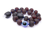 Raw amber teething bracelet or anklet for kids with dark cherry Baltic amber beads and symbolic Evil Eye protection charm