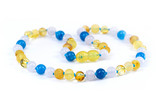 Mixed-gemstone children’s necklace made from Baltic amber with aquamarine and apatite accents - traditional teething style design