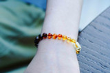 Certified Baltic amber teething bracelet with multicoloured polished baroque beads, handcrafted jewellery piece made in the Baltic region