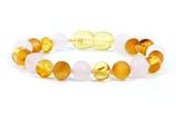 Baltic amber bracelet or anklet for children with raw and polished baroque beads and matte pink rose quartz gemstones on a light pink cord - traditional teething style design