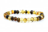 Stylish yet meaningful, this Green Baltic Amber Bracelet showcases the natural beauty of authentic amber for men and women alike. A perfect blend of craftsmanship and style, shipped from Europe to the UK, Ireland, USA, Canada, and Australia