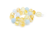 Honey Baltic amber teething anklet for kids with rounded baroque amber beads and natural blue aquamarine