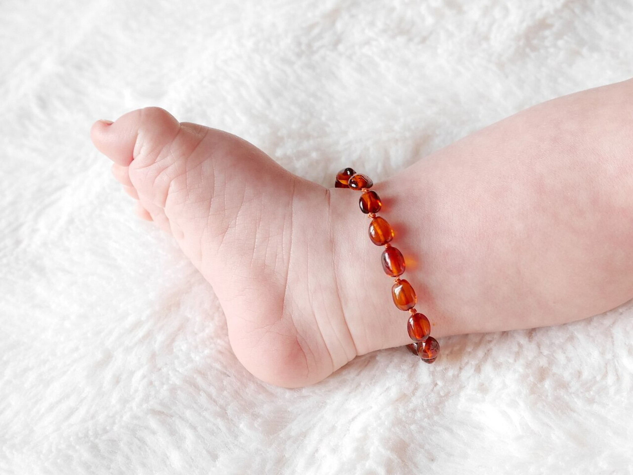 amber teething and colic anklet bracelet with polished cognac olive beads 98320.1644351506