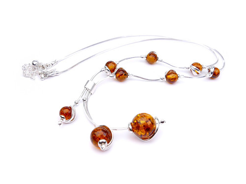 Baltic amber adjustable  sterling silver swirl drop necklace