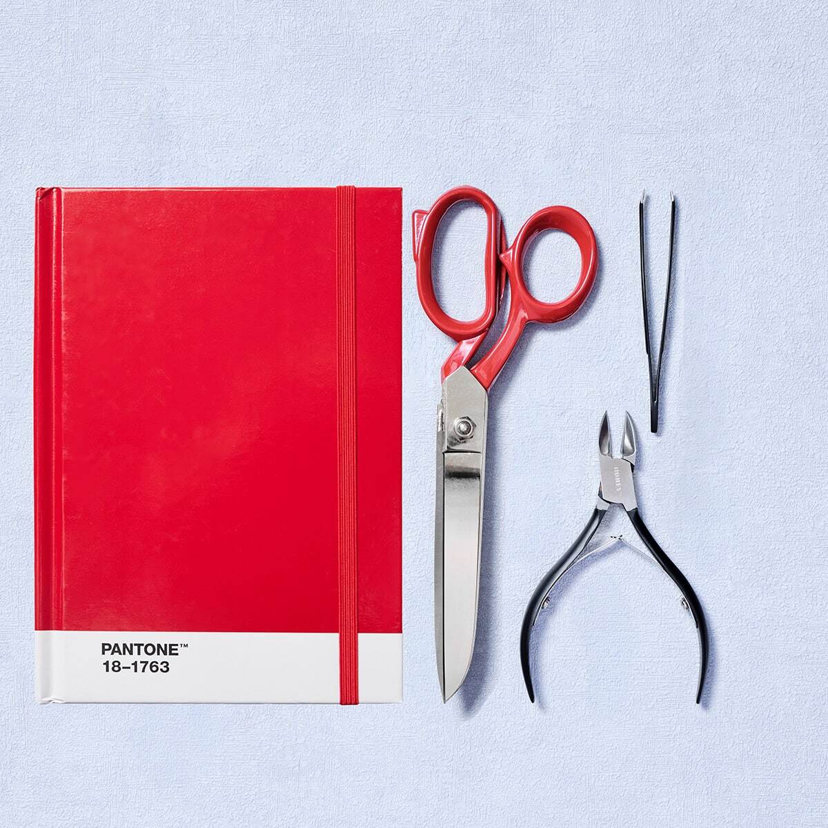 Lifestyle categorie afbeelding met notitieboek, schaar, pincet