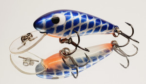 Versatile little lure suitable for a wide variety of fish species such as Trout, Bass, Bream, Redfin etc.
Wide action diving to 8ft and is a floating diver. 


Solid Polyurethane. 