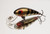 Versatile little lure suitable for a wide variety of fish species such as Trout, Bass, Bream, Redfin etc.
Wide action diving to 8ft and is a floating diver. 


Solid Polyurethane.