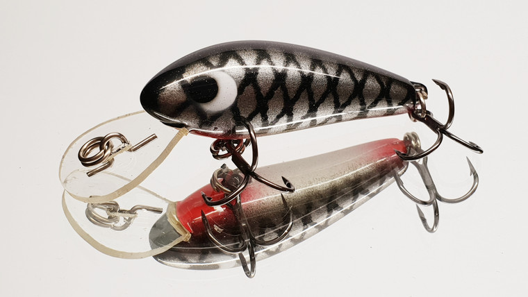 Versatile little lure suitable for a wide variety of fish species such as Trout, Bass, Bream, Redfin etc.
Wide action diving to 8ft and is a floating diver. 


Solid Polyurethane.