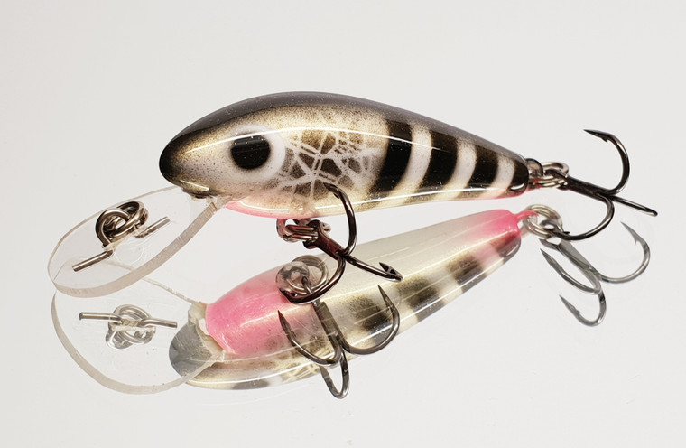 Versatile little lure suitable for a wide variety of fish species such as Trout, Bass, Bream, Redfin etc.
Wide action diving to 8ft and is a floating diver. 


Solid Polyurethane. 