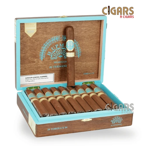 Open box of H. Upmann by AJ Fernandez Toro 6 x 54 cigars arranged in rows, displaying Ecuadorian Sumatra wrappers, decorative cigar bands, and branded packaging