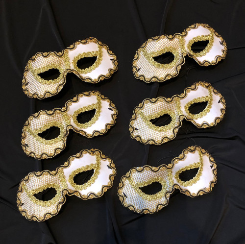 White and gold party masks