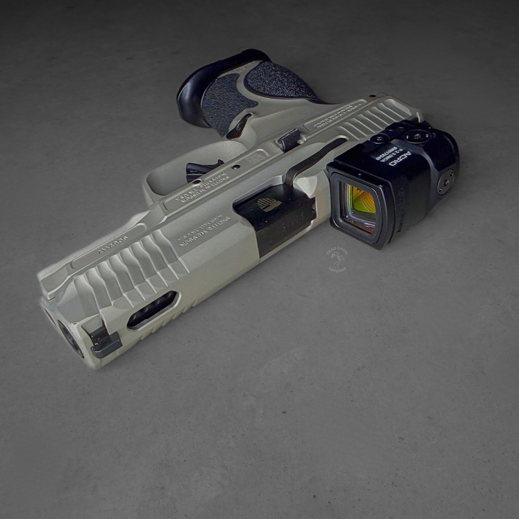 Smith & Wesson, M&P M2.0 Metal Compact, Spec Series VI, Semi-automatic, Striker Fired, Aluminum Frame Pistol, Compact, 9MM, 4" Barrel, Cerakote Finish, Champagne, Aimpoint ACRO P-2 Optic, Inline Ported Slide, Floyds Custom Shop EDC Magwell and Baseplates, Adjustable Sights, 15 Rounds, 3 Magazines, Includes Savior Pistol Bag, Hunter Constantine Carry Belt, Spec Series VI Knife & Spec Series Patch, 14634
UPC: 022188905021, Smith & Wesson M&P M2.0 Metal Compact Spec Series VI with Aimpoint ACRO P-2 optic
Ported slide M&P M2.0 Metal Compact Spec Series VI performance pistol
Floyd’s Custom Shop magwell on Smith & Wesson M&P M2.0 Spec Series VI
Smith & Wesson M&P M2.0 Metal Compact Spec Series VI bundle with ACRO optic and accessories