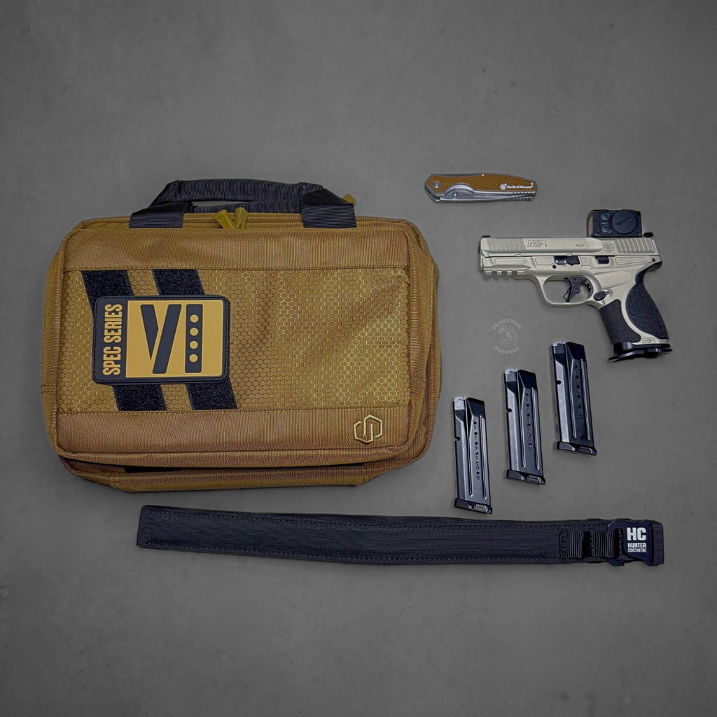 Smith & Wesson, M&P M2.0 Metal Compact, Spec Series VI, Semi-automatic, Striker Fired, Aluminum Frame Pistol, Compact, 9MM, 4" Barrel, Cerakote Finish, Champagne, Aimpoint ACRO P-2 Optic, Inline Ported Slide, Floyds Custom Shop EDC Magwell and Baseplates, Adjustable Sights, 15 Rounds, 3 Magazines, Includes Savior Pistol Bag, Hunter Constantine Carry Belt, Spec Series VI Knife & Spec Series Patch, 14634
UPC: 022188905021, Smith & Wesson M&P M2.0 Metal Compact Spec Series VI with Aimpoint ACRO P-2 optic
Ported slide M&P M2.0 Metal Compact Spec Series VI performance pistol
Floyd’s Custom Shop magwell on Smith & Wesson M&P M2.0 Spec Series VI
Smith & Wesson M&P M2.0 Metal Compact Spec Series VI bundle with ACRO optic and accessories