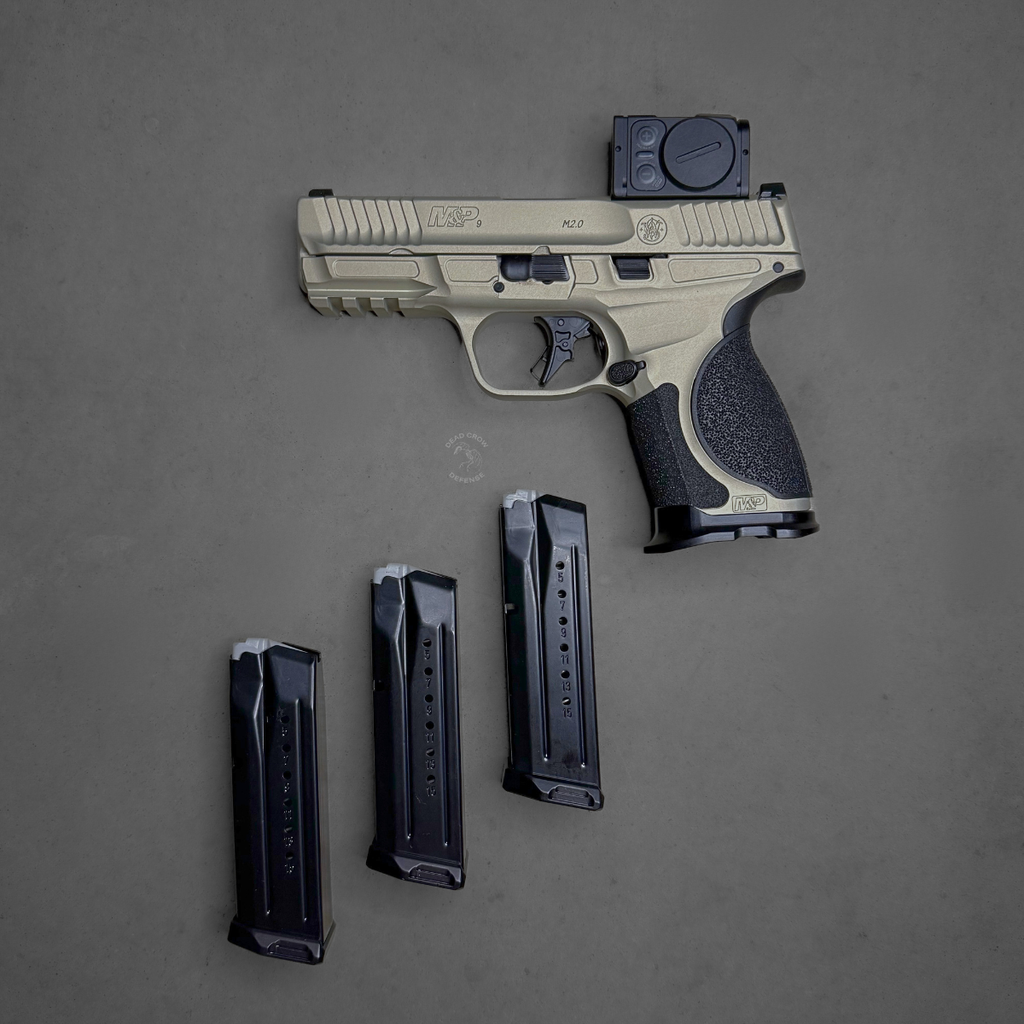 Smith & Wesson, M&P M2.0 Metal Compact, Spec Series VI, Semi-automatic, Striker Fired, Aluminum Frame Pistol, Compact, 9MM, 4" Barrel, Cerakote Finish, Champagne, Aimpoint ACRO P-2 Optic, Inline Ported Slide, Floyds Custom Shop EDC Magwell and Baseplates, Adjustable Sights, 15 Rounds, 3 Magazines, Includes Savior Pistol Bag, Hunter Constantine Carry Belt, Spec Series VI Knife & Spec Series Patch, 14634
UPC: 022188905021, Smith & Wesson M&P M2.0 Metal Compact Spec Series VI with Aimpoint ACRO P-2 optic
Ported slide M&P M2.0 Metal Compact Spec Series VI performance pistol
Floyd’s Custom Shop magwell on Smith & Wesson M&P M2.0 Spec Series VI
Smith & Wesson M&P M2.0 Metal Compact Spec Series VI bundle with ACRO optic and accessories