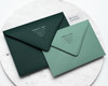 green printed envelopes