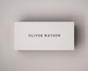 Personalised ivory place card printed in black serif font, centred cleanly on 300gsm almond cardstock.