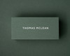 The khaki green flat place card personalised with the name in white ink using a bold, modern typeface.