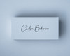 A Powder Blue place card with printed in black ink, showcasing the elegant script font and crisp contrast.
