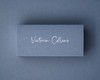 Personalised Airforce Blue place card printed in elegant white ink script, on premium 300gsm card.