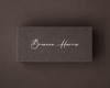 Personalised cocoa brown flat place card with a name printed in elegant white ink.
