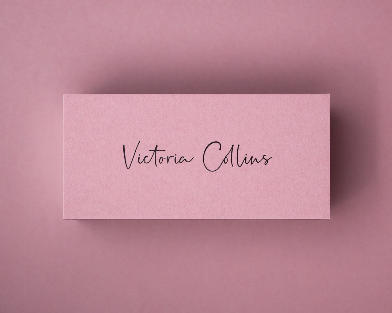 Dusty Rose place card printed in black ink, showcasing personalised wedding or baby shower stationery.