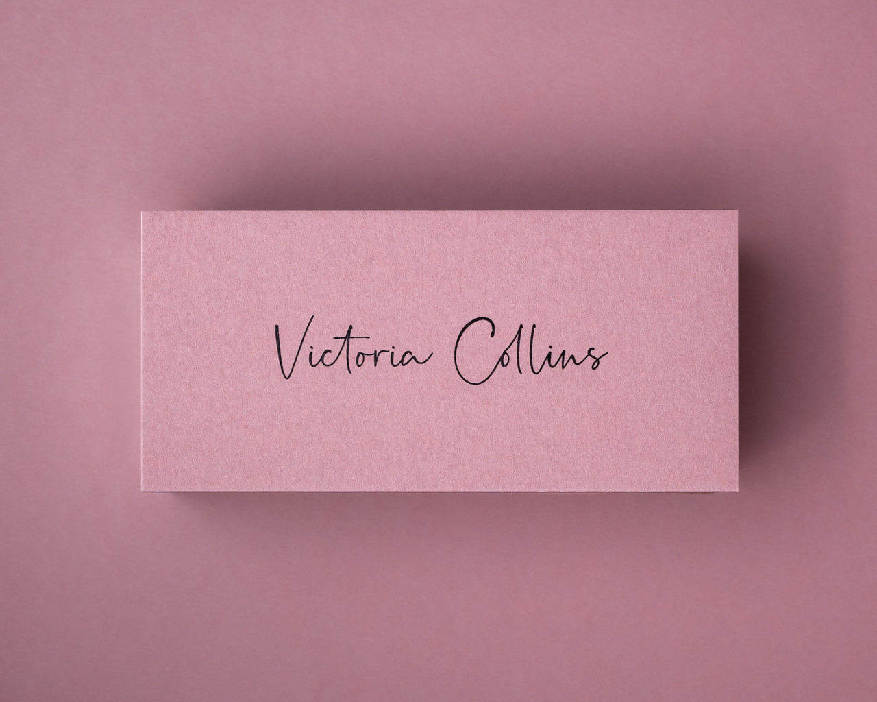 Dusty Rose place card printed in black ink, showcasing personalised wedding or baby shower stationery.