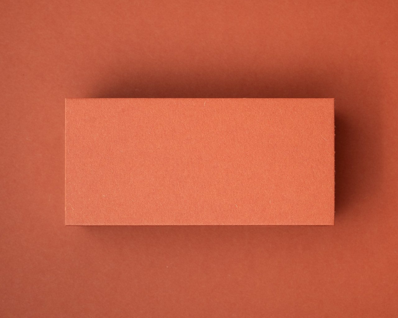 Blank Burnt Orange flat place card made from matte 270gsm or 350gsm cardstock, ideal for custom white or black ink name printing for weddings or autumn events.