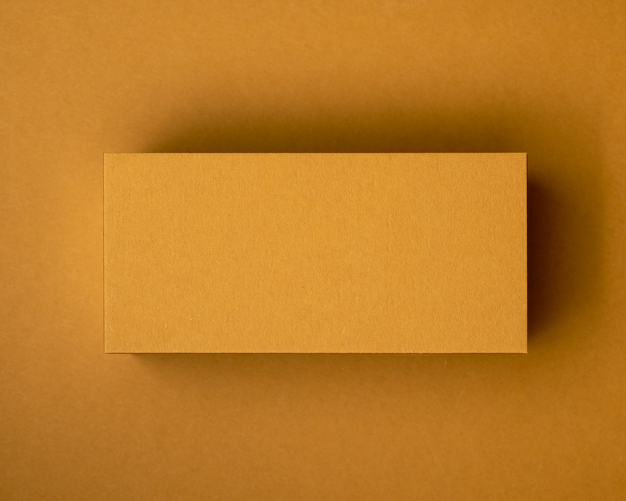 Blank Mustard flat place card made from 380gsm matte cardstock, ready for white or black ink customisation for weddings, parties, or events.