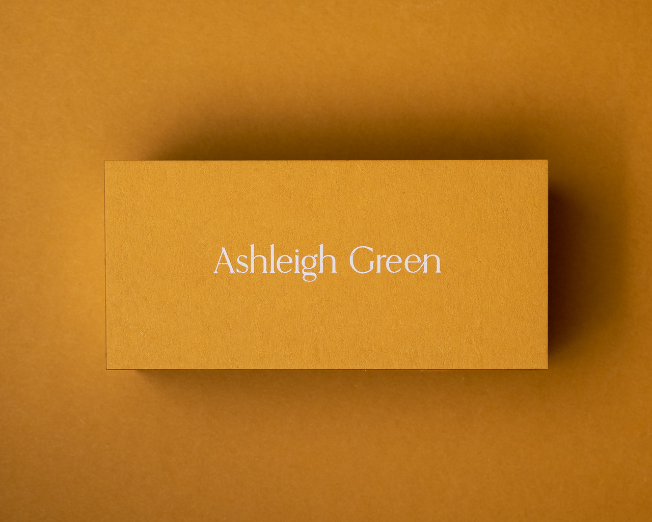 Mustard flat place card featuring the sample printed in white ink on 380gsm card, ideal for bold and creative table styling.