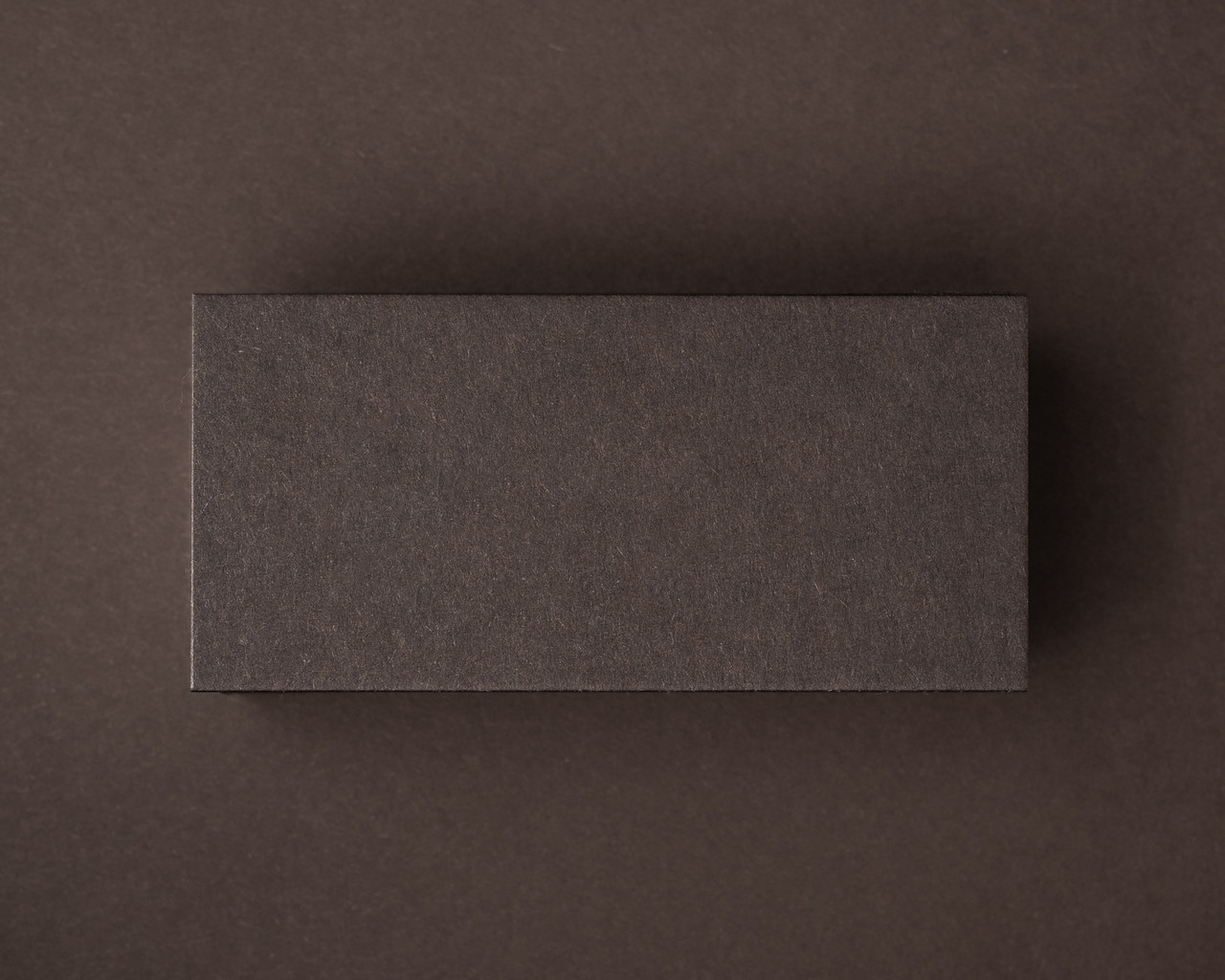 Flat cocoa brown place card in 270gsm cardstock with a plain, unprinted surface.