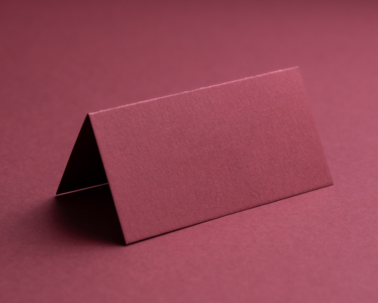Folded deep rose place card in 300gsm card, blank and ready for personalisation.