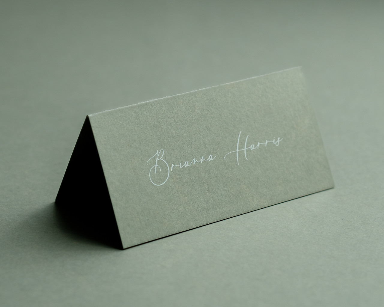 Sage Green folded place card with white ink printing – minimalist and elegant table name card.
