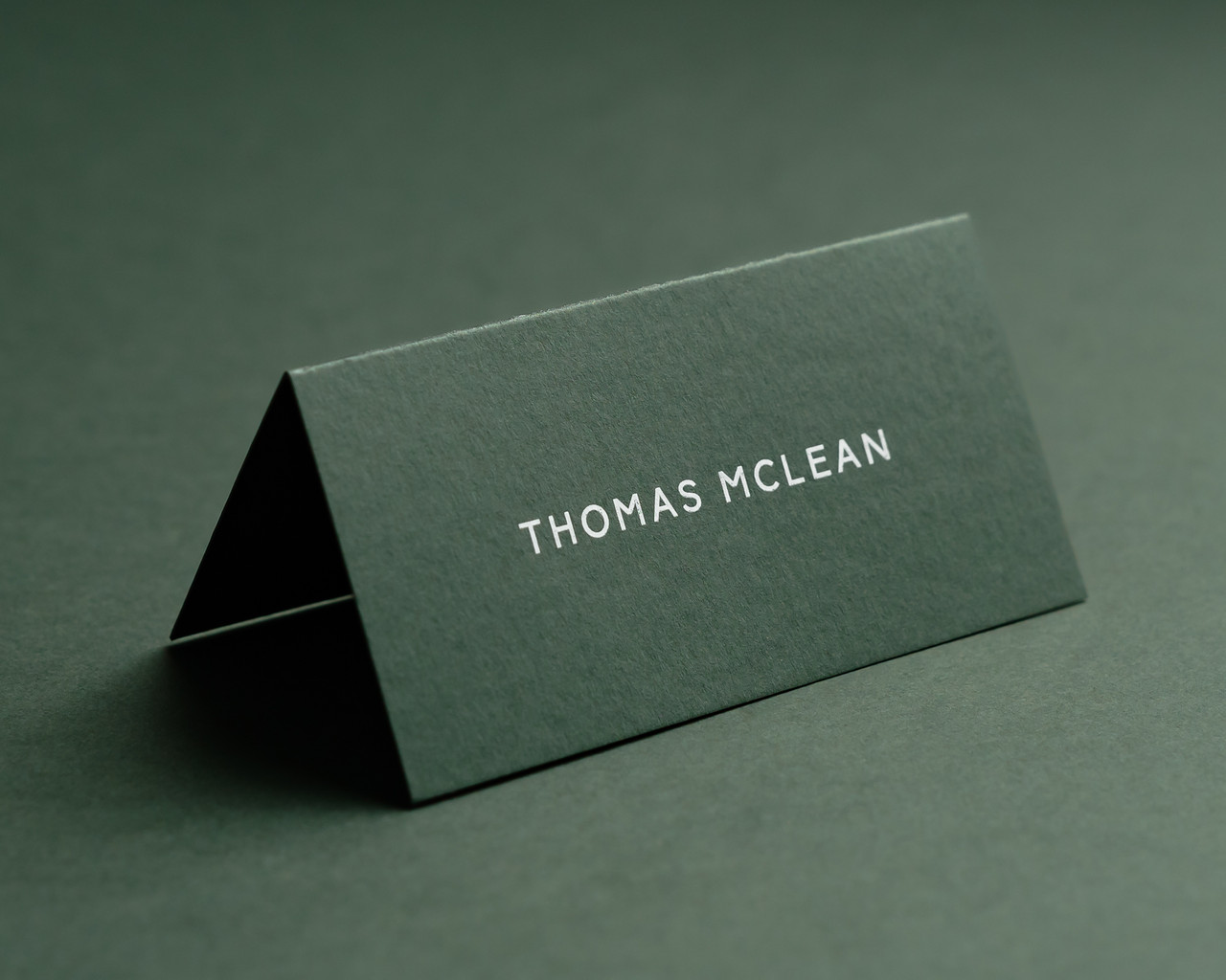Personalised khaki folded place card with white ink printing